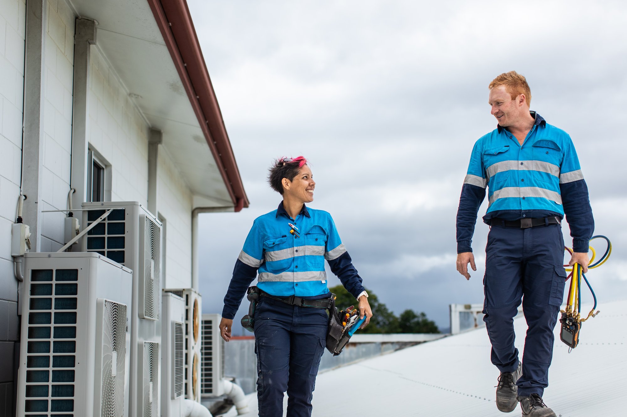 Two installers smiling image Two installers smiling image